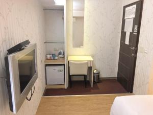 Kuchyň nebo kuchyňský kout v ubytování Say Love Hotel