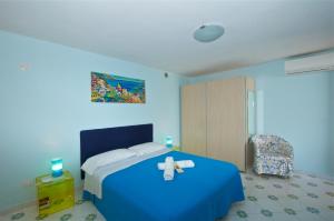 Posteľ alebo postele v izbe v ubytovaní Villa Casale Ravello Residence