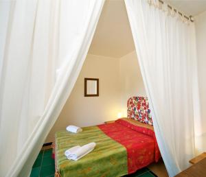 Posteľ alebo postele v izbe v ubytovaní Villa Casale Ravello Residence