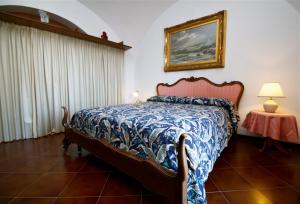 Posteľ alebo postele v izbe v ubytovaní Villa Casale Ravello Residence