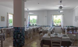 A restaurant or other place to eat at Locanda Villa Fiori