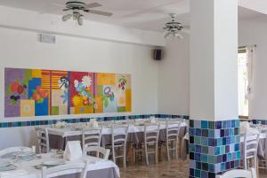 A restaurant or other place to eat at Locanda Villa Fiori