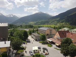 an aerial view of a town with mountains in the background at Rooftop Apartment in Bad Hofgastein
