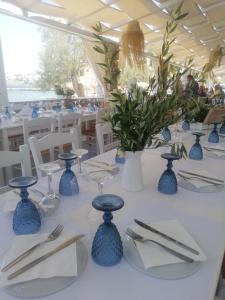 Reštaurácia alebo iné gastronomické zariadenie v ubytovaní ''Di Mare'' Hotel & Suites