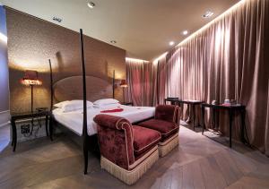 Voodi või voodid majutusasutuse Hotel Palazzo Barbarigo Sul Canal Grande toas