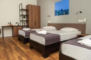 Postel nebo postele na pokoji v ubytování Vista Hotel