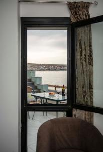 Posezení v ubytování Sunrise Beachfront Apartment