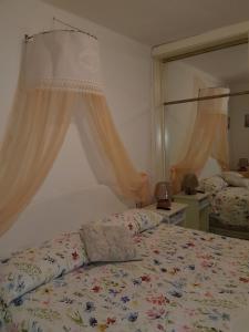 Posteľ alebo postele v izbe v ubytovaní ControVento Apartament II