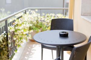 A balcony or terrace at B&B Le City