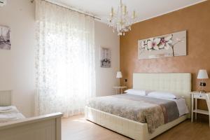 A bed or beds in a room at B&B Le City