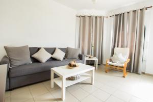 Posezení v ubytování Kimata Apartments