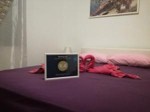 Postel nebo postele na pokoji v ubytování Apartments Phoenix