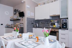 A kitchen or kitchenette at B&B Le City