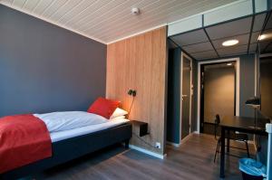 Voodi või voodid majutusasutuse Narvik Hotel Wivel toas