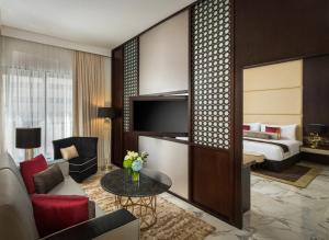 Postel nebo postele na pokoji v ubytování Millennium Place Dubai Marina