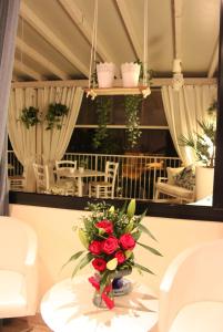Un lugar para sentarse en Hotel Loretta & Dependance