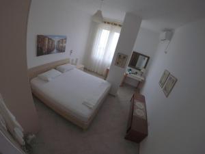 Ліжко або ліжка в номері Villa Goxhi
