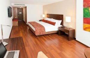 TV a/nebo společenská místnost v ubytování Hotel Estelar Calle 100