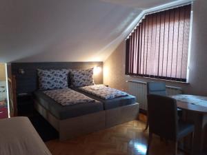 Łóżko lub łóżka w pokoju w obiekcie Smx Apartement