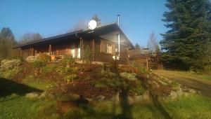 a house with a light on top of it at Blockhaus FerienZauber II in Bromskirchen