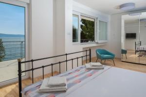 Posteľ alebo postele v izbe v ubytovaní Absolute Beach Villa + 31 fotografií