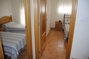Posteľ alebo postele v izbe v ubytovaní Urb Palm Beach