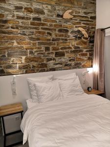 Ένα ή περισσότερα κρεβάτια σε δωμάτιο στο La Semois Et Moi