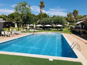Πισίνα στο ή κοντά στο Bungalows Papalus - Golf Lloret -