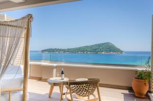 a room with a view of the ocean at Agorastos Hotel in Koinyra