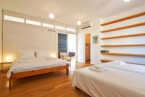 מיטה או מיטות בחדר ב-Impressive apartment with amazing views - MK1