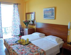 Postel nebo postele na pokoji v ubytování Sofia Hotel