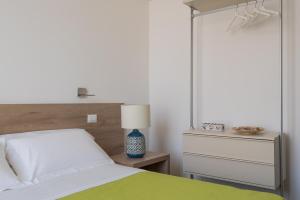 Postel nebo postele na pokoji v ubytování Archinuè