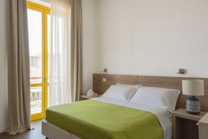 Postel nebo postele na pokoji v ubytování Archinuè
