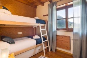 Postel nebo postele na pokoji v ubytování Luderna - Apartamento Orri A4