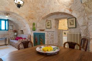Posedenie v ubytovaní Stile e relax nei trulli by Wonderful Italy