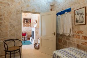Posteľ alebo postele v izbe v ubytovaní Stile e relax nei trulli by Wonderful Italy