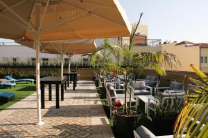 מסעדה או מקום אחר לאכול בו ב-Jaffo Tel-Aviv King Gallery Boutique Hotel