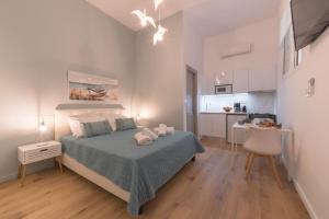 Postel nebo postele na pokoji v ubytování Saint George cozy studio