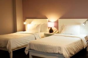 Postel nebo postele na pokoji v ubytování Lilac Relax-Residence + 37 fotografií