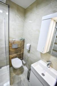 A bathroom at Miido Apartments