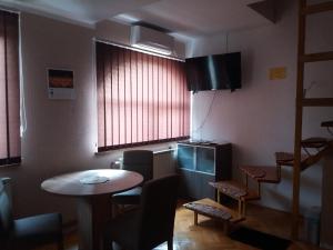 Telewizja i/lub zestaw kina domowego w obiekcie Smx Apartement