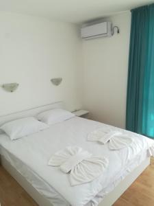 Un pat sau paturi într-o cameră la Apartment Rutland