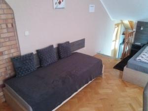Łóżko lub łóżka w pokoju w obiekcie Smx Apartement