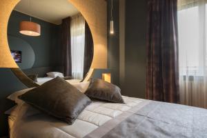 Postel nebo postele na pokoji v ubytování Le Texture Premium Rooms Duomo-Cordusio