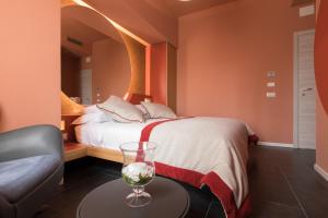 Postel nebo postele na pokoji v ubytování Le Texture Premium Rooms Duomo-Cordusio