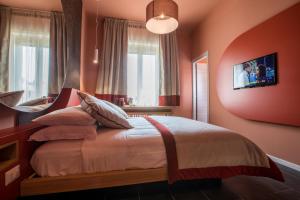 Postel nebo postele na pokoji v ubytování Le Texture Premium Rooms Duomo-Cordusio