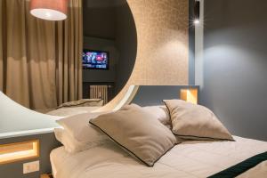 TV a/nebo společenská místnost v ubytování Le Texture Premium Rooms Duomo-Cordusio