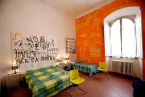 Posteľ alebo postele v izbe v ubytovaní B&B Le Lupe