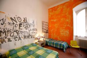 Posteľ alebo postele v izbe v ubytovaní B&B Le Lupe
