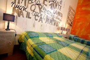 Posteľ alebo postele v izbe v ubytovaní B&B Le Lupe